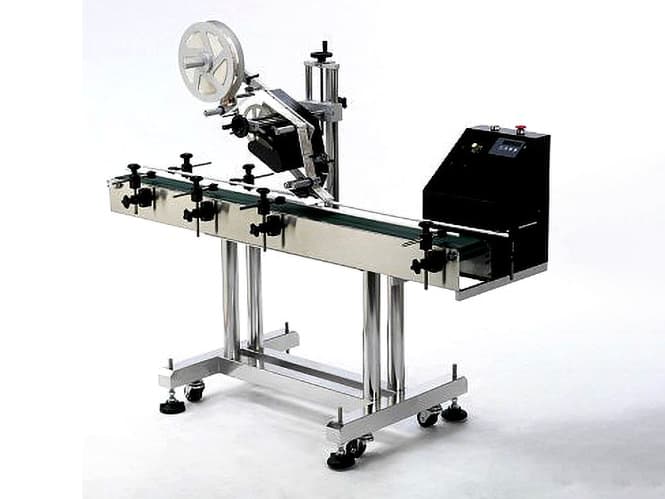 Inline top labeler